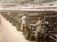 Workers twist yarn